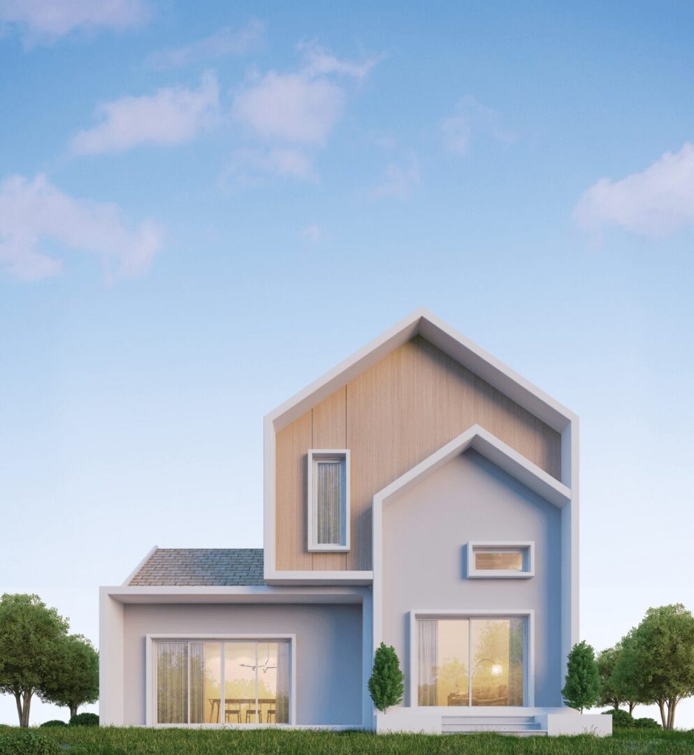 Modern house with trees under blue sky.